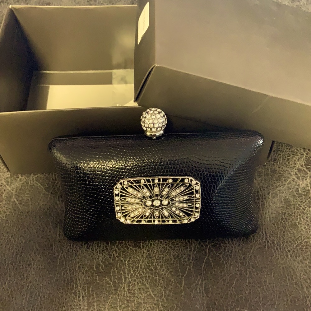 Elegant black indispensable clutch.